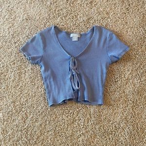 blue cropped shirt